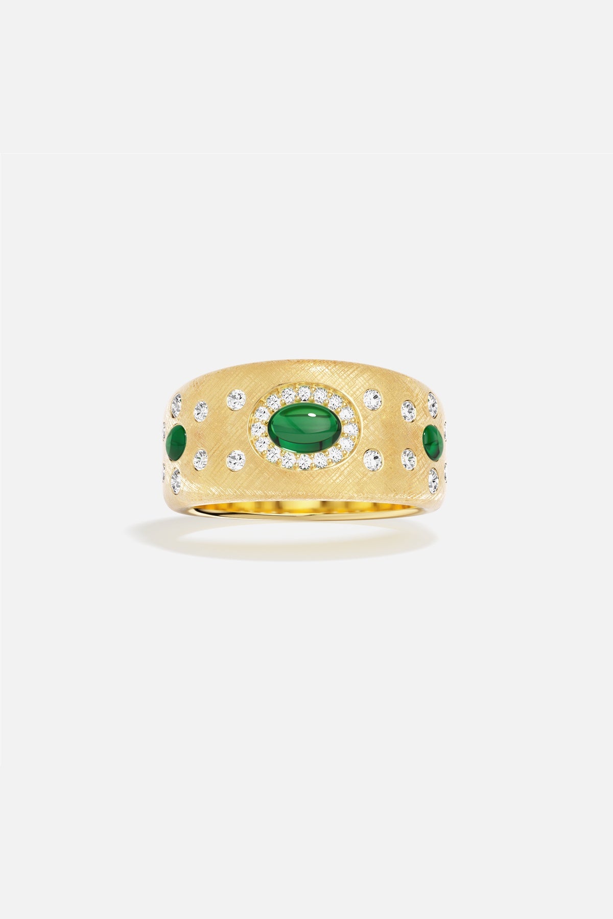 APM Ring in golden hue, brushed finish with emerald accents, quietly regal.