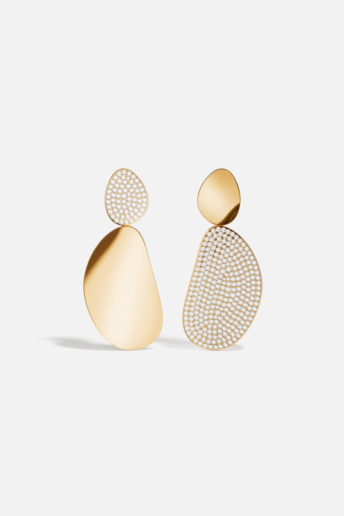 APM Earrings in golden pebble shapes, a play of shimmer and shine.