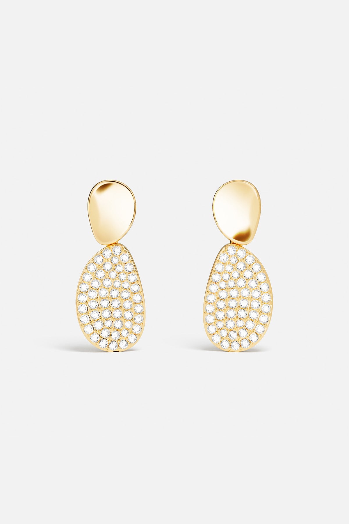 APM Earrings in golden hues, a luminous drop of understated elegance.