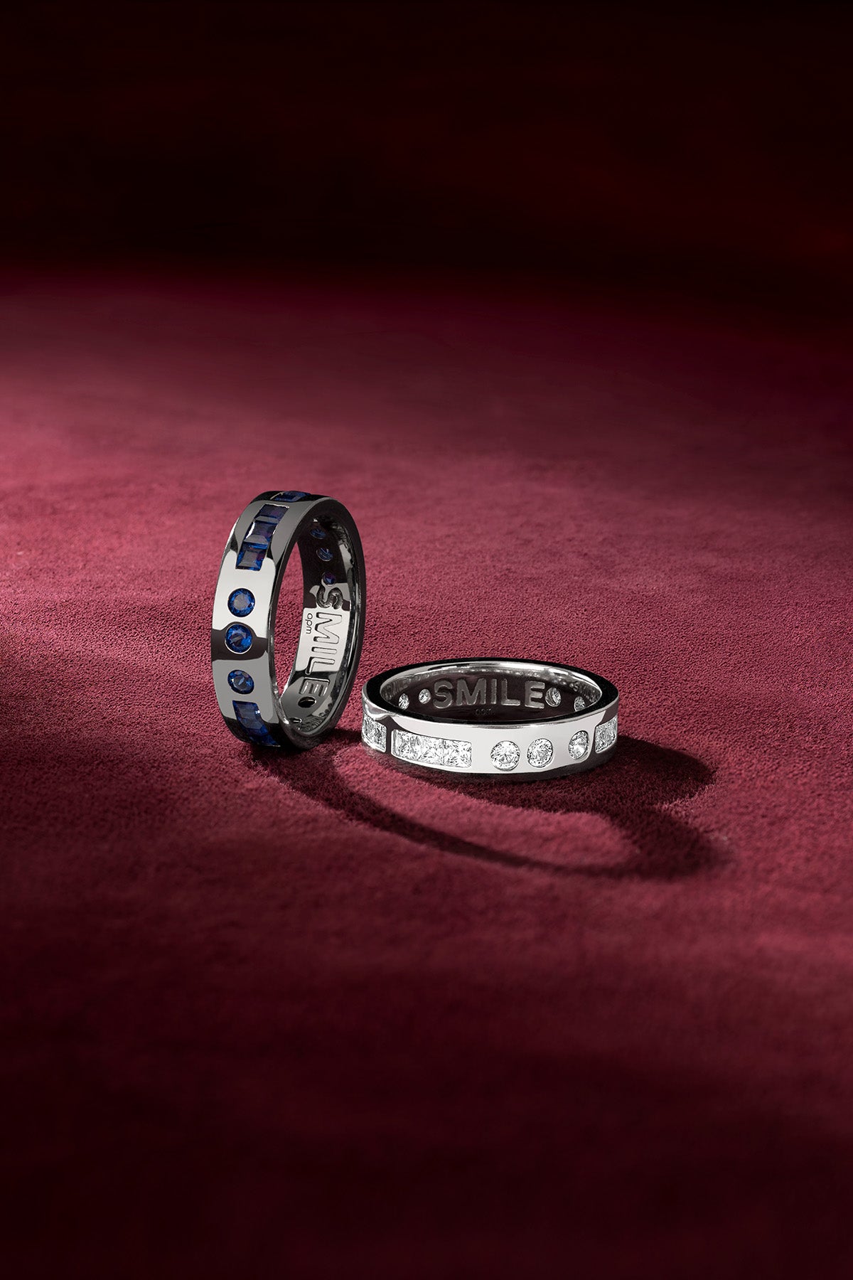 APM Smile Rings, a duet of blue and clear brilliance on velvet.