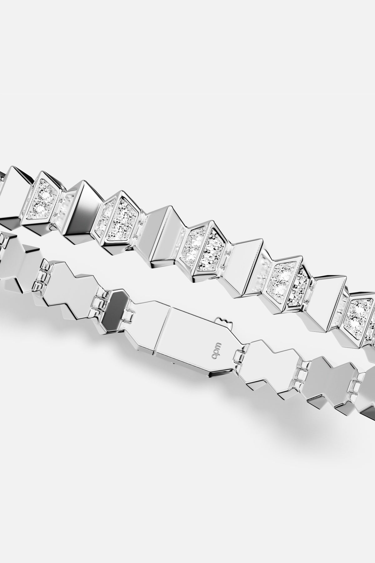 APM Monaco Bracelet in rhodium finish, sharp geometry with a luminous edge.