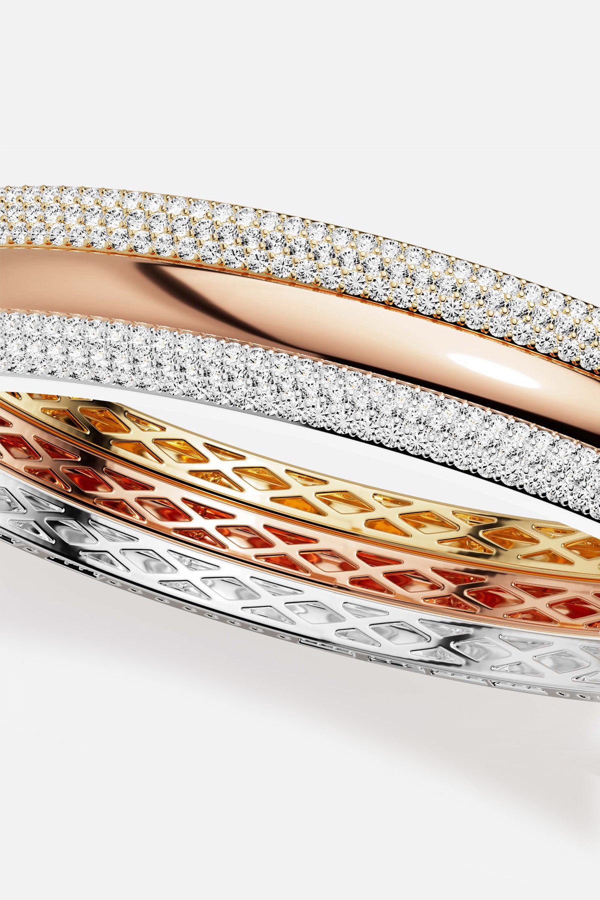APM Bangles in three colors, radiant sparkle and modern elegance intertwined.