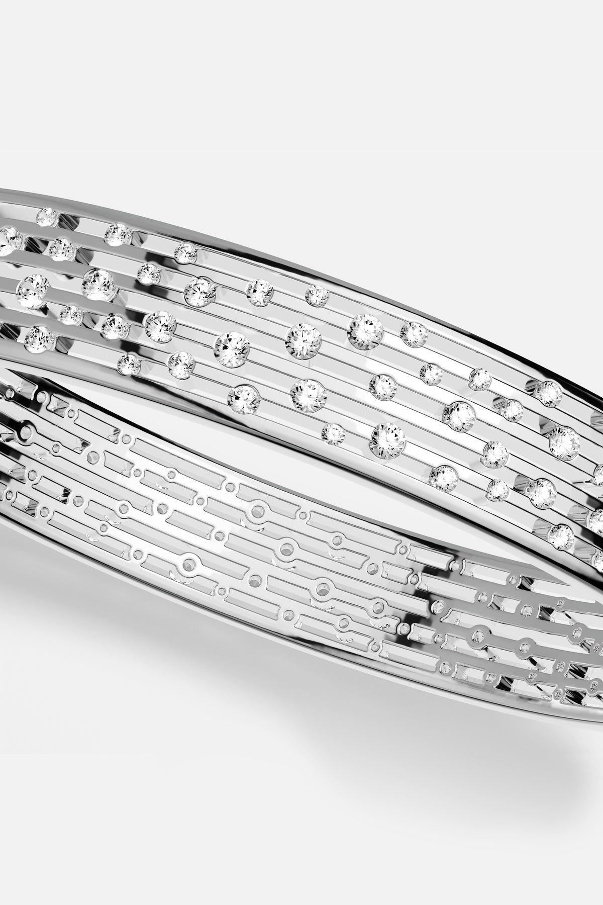 APM Monaco bangle in rhodium finish, scattered stones catching light like quiet stardust.