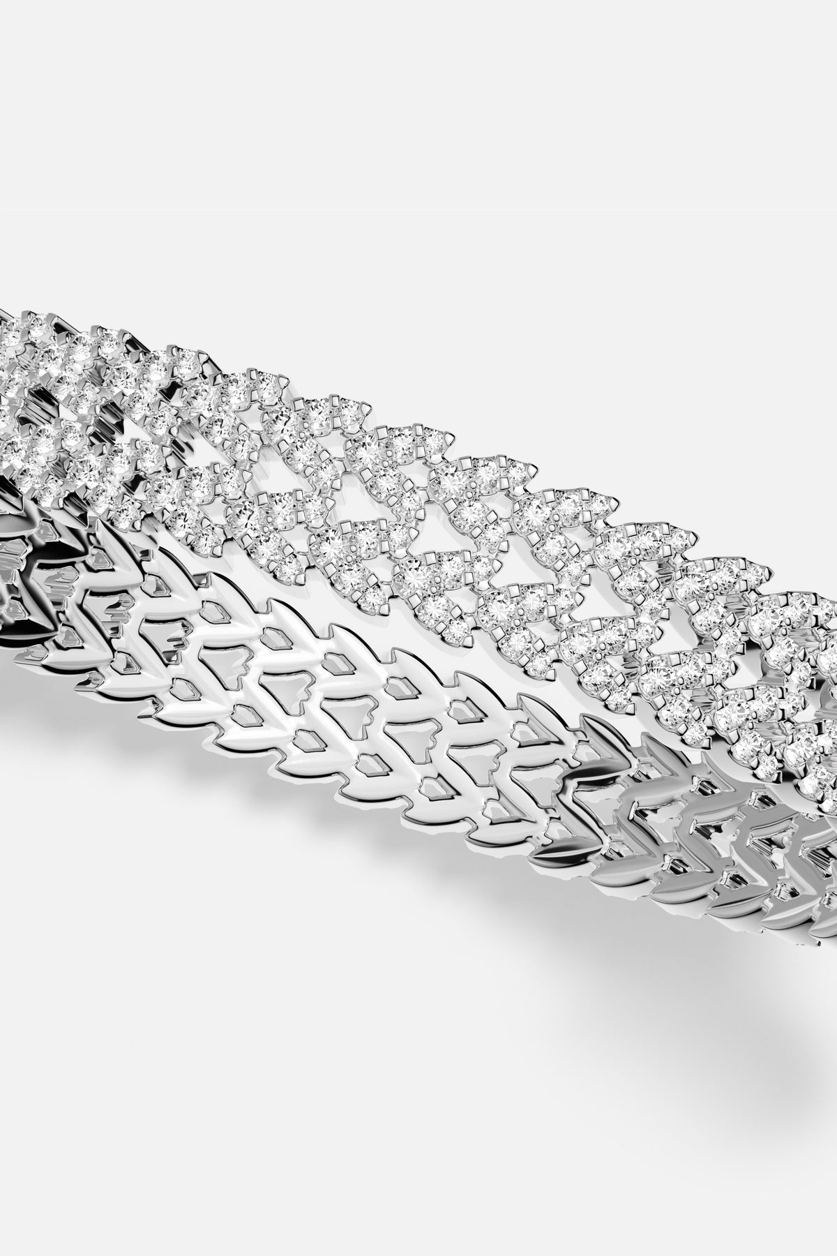 APM Bracelet, a bold chain shimmering with pavé brilliance and rhodium finish.