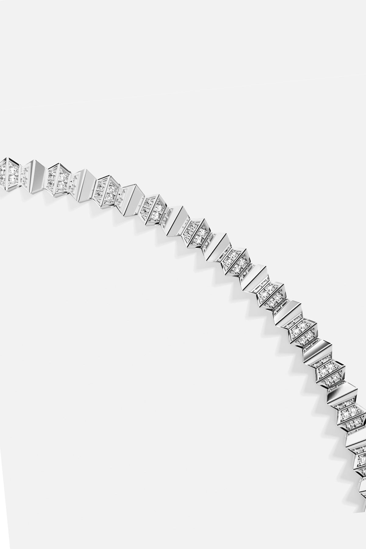 APM Bracelet in rhodium finish, a modern zigzag of light and geometry.