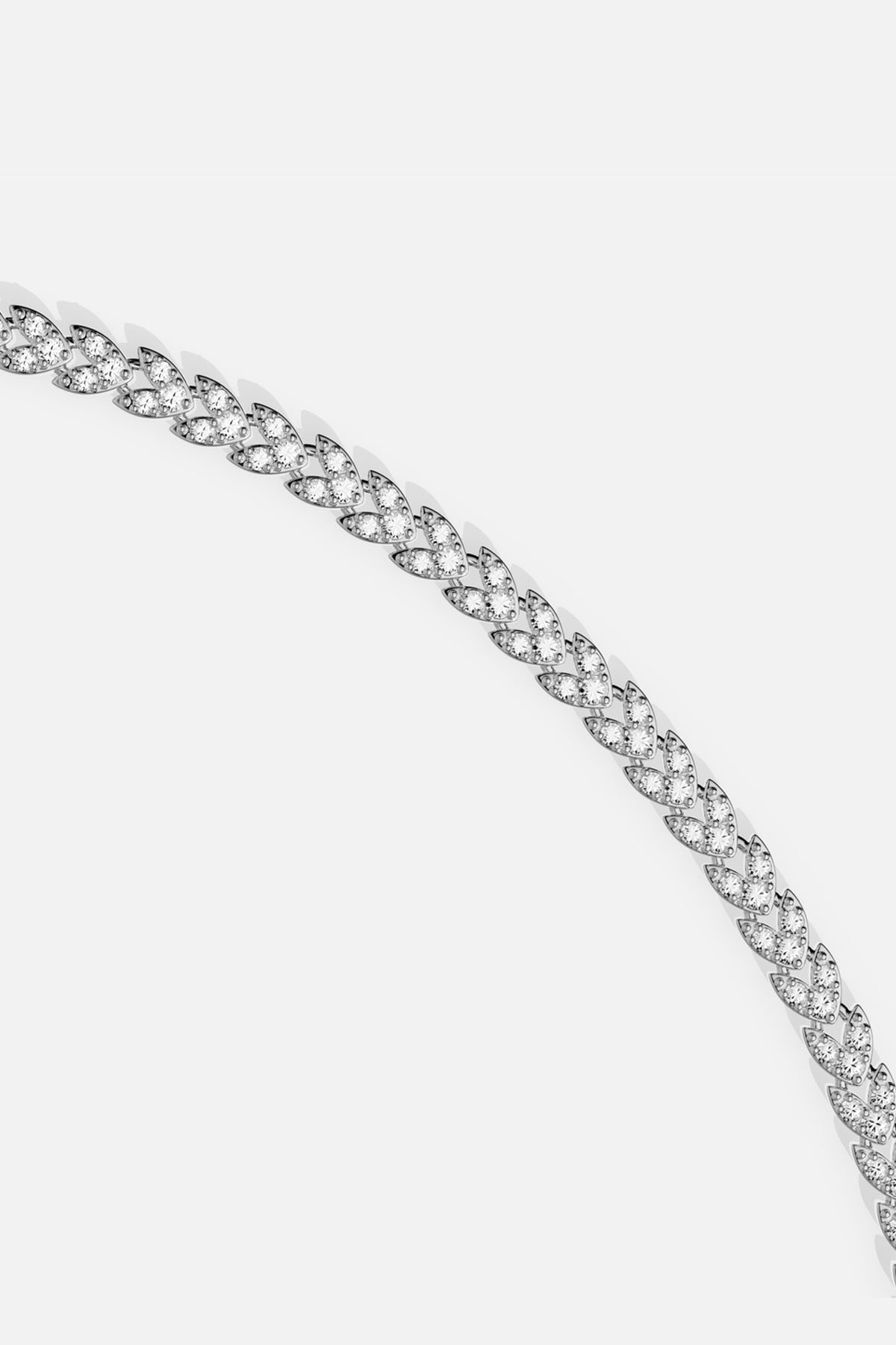 APM Bracelet in rhodium finish, a delicate cascade of shimmering leaves.