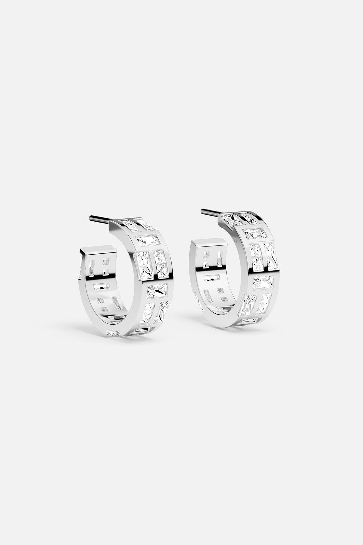 APM Hoop Earrings, luminous rhodium finish with a modern architectural edge.