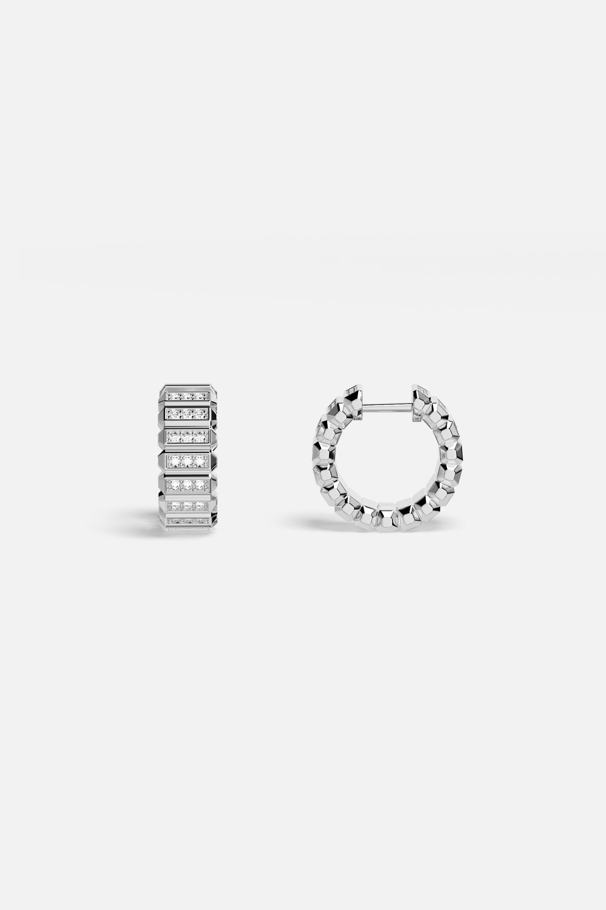 APM Hoop Earrings in rhodium finish, faceted brilliance for effortless modern edge.