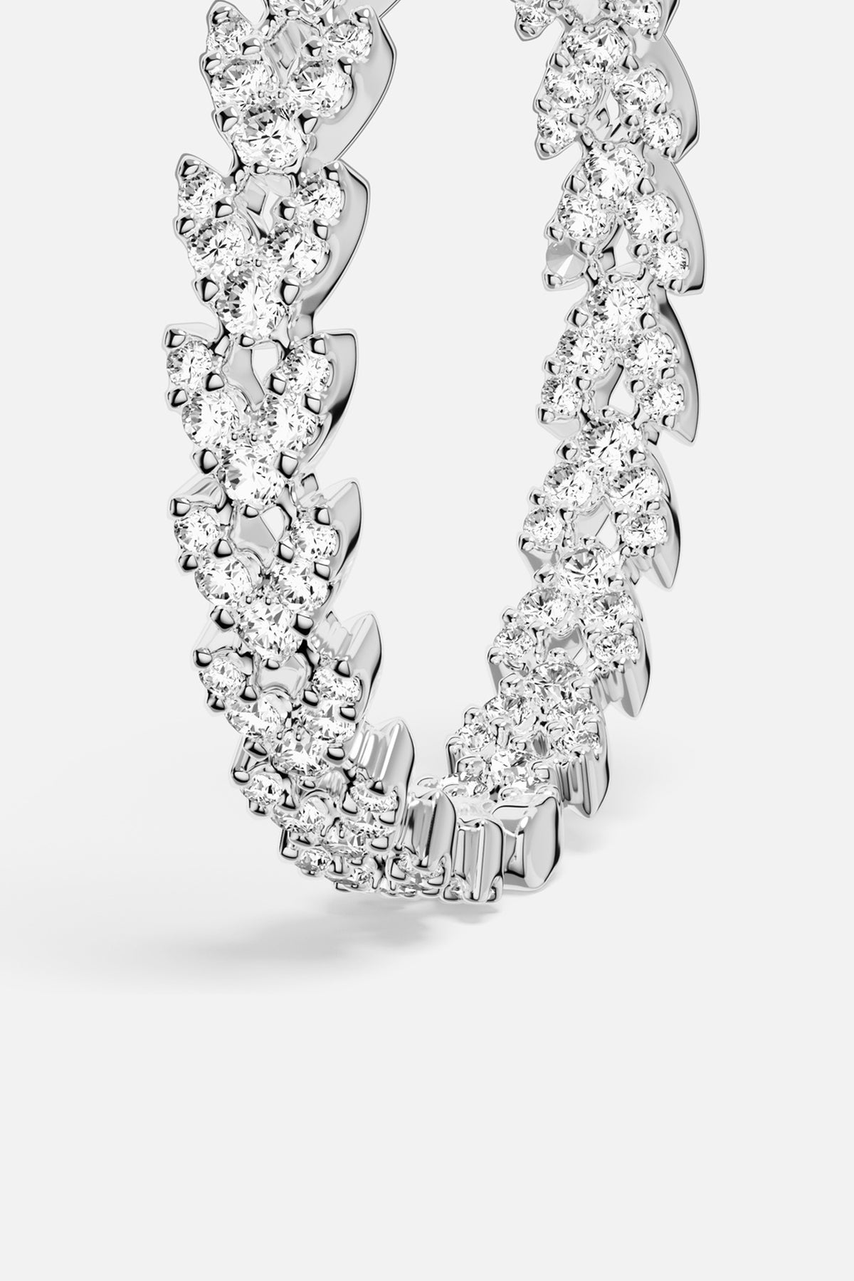APM Hoop Earrings, a sparkling chain silhouette in rhodium finish, effortlessly radiant.