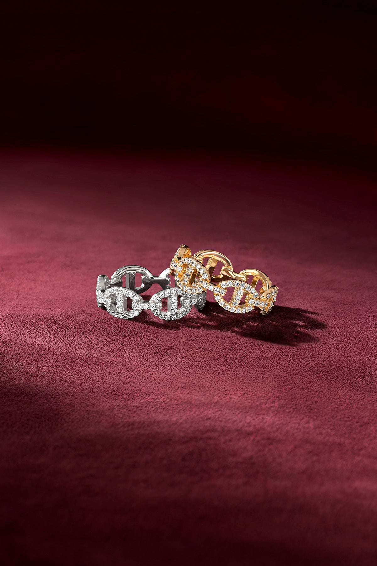 APM Morse Rings, shimmering links in two colors, a bold contemporary duet.