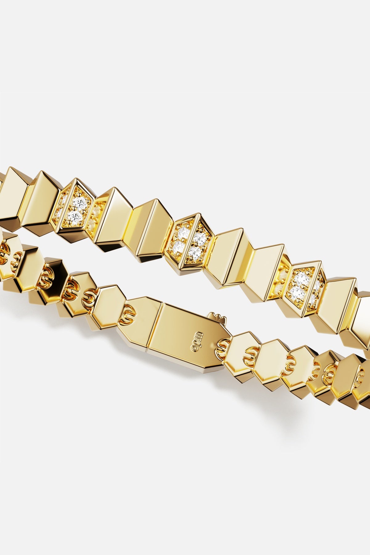 APM Bracelet in golden hues, geometric links shining with quiet, modern elegance.