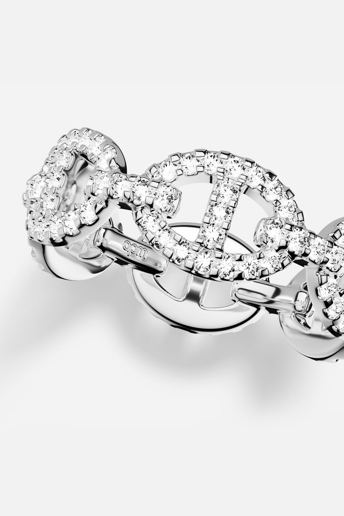 APM Morse Ring, sparkling links in rhodium finish, effortlessly chic.