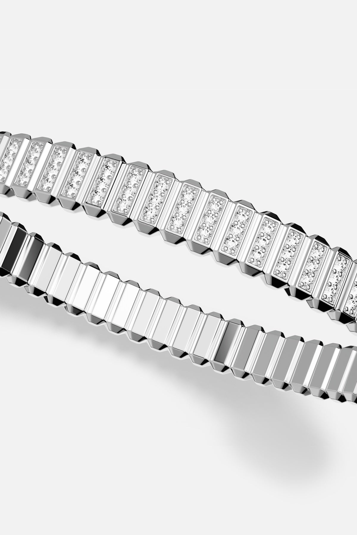 APM Bracelet, ridged rhodium finish glowing with quiet architectural elegance.
