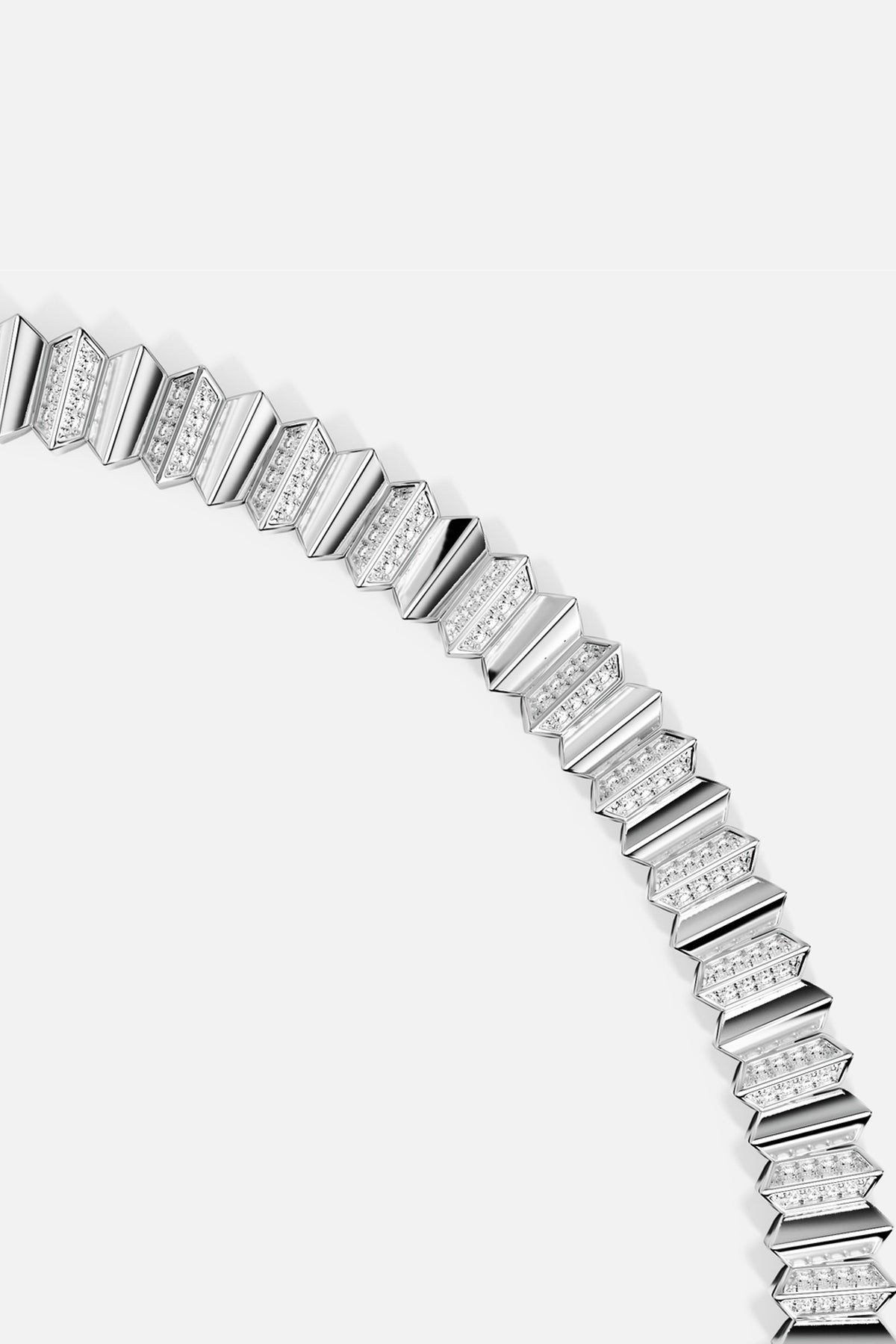 APM Monaco bracelet, sculpted geometric links with a luminous rhodium finish, effortlessly modern.