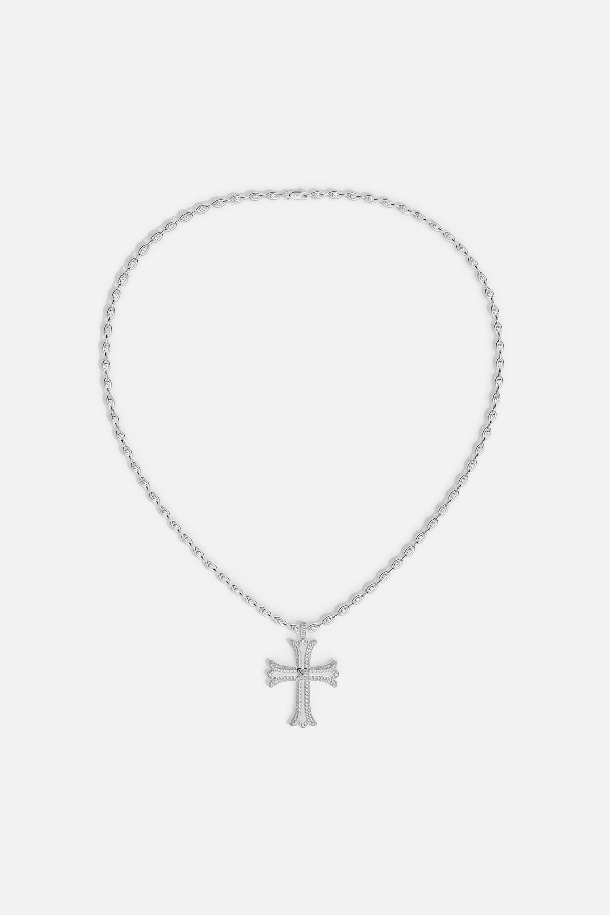 APM Cross Necklace, a rhodium finish statement with quiet, timeless allure.