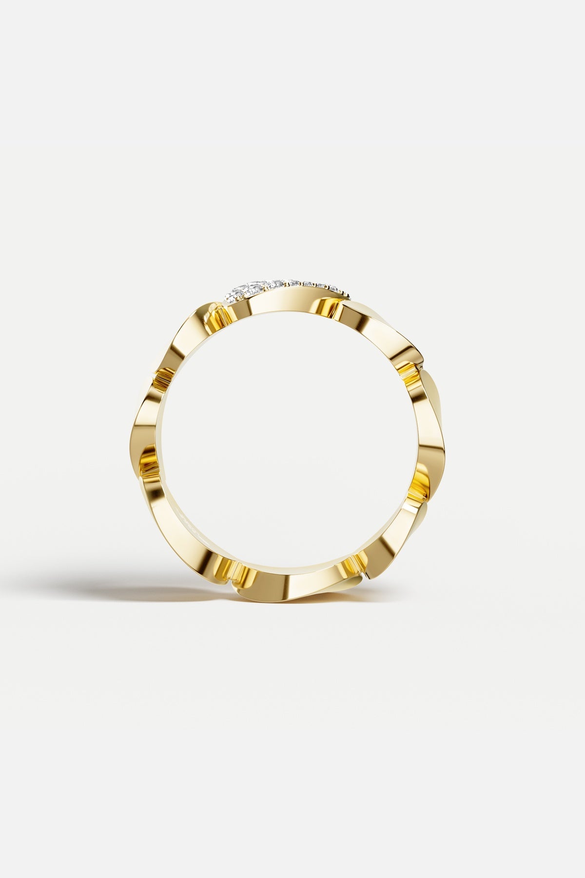 APM Ring in golden hues, a sculpted whisper of modern elegance.