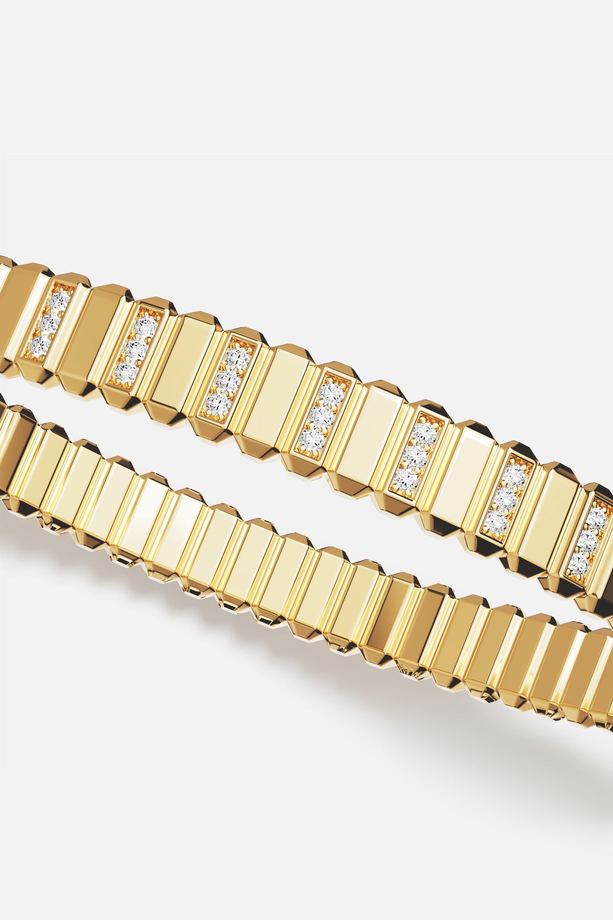 APM Bracelet in golden ridges, sparkling with quiet, contemporary allure.