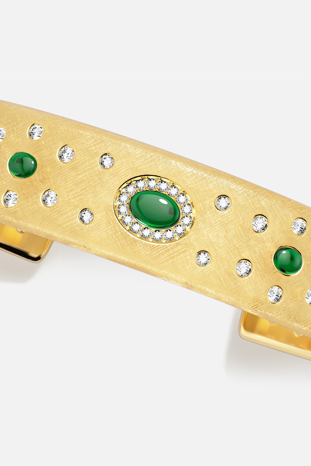 APM Hair Clip in golden hues, scattered crystals and green stones, quiet opulence.