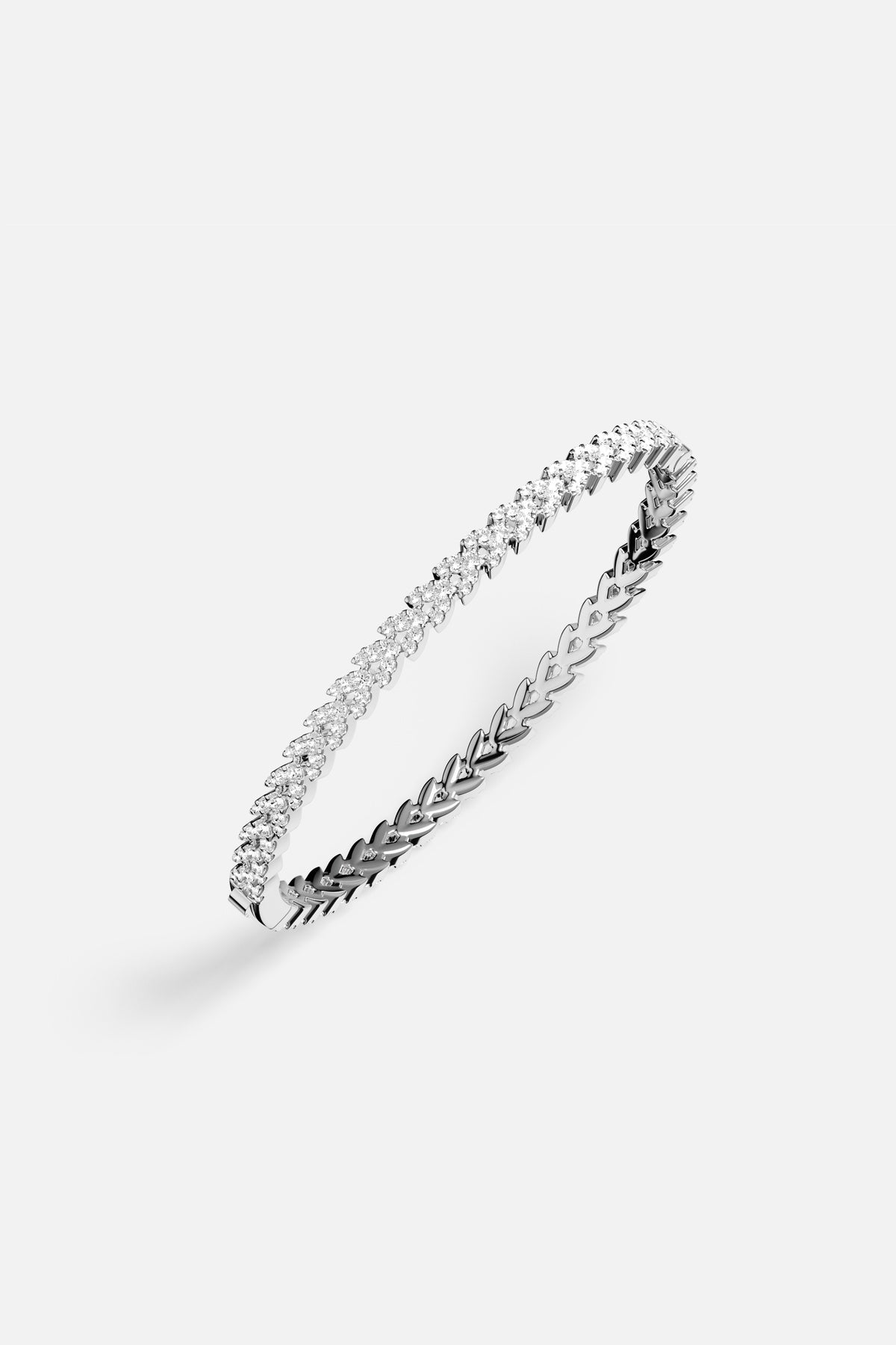 APM Bracelet in rhodium finish, a shimmering whisper of modern elegance.