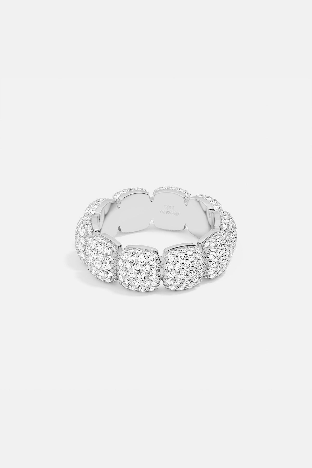 APM MONACO silver ring with embedded white stones on a white background