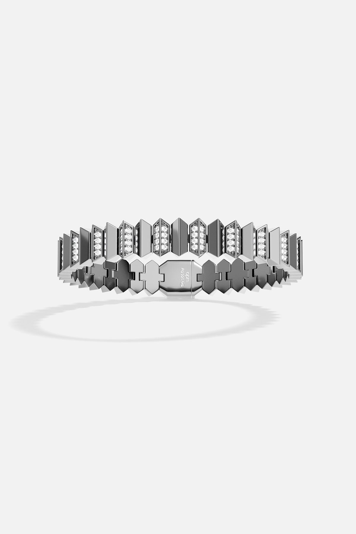 Silver bracelet with geometric design on a white background
