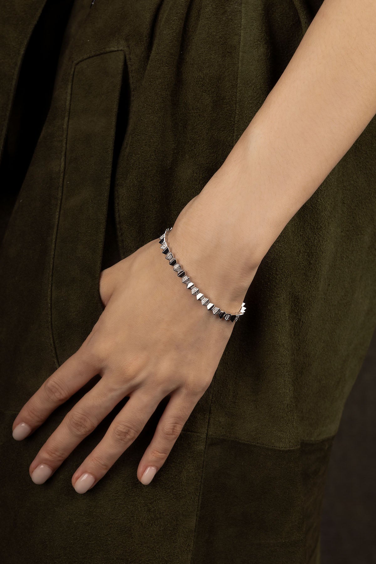 APM Monaco Up and Down Bracelet in silver worn on hand