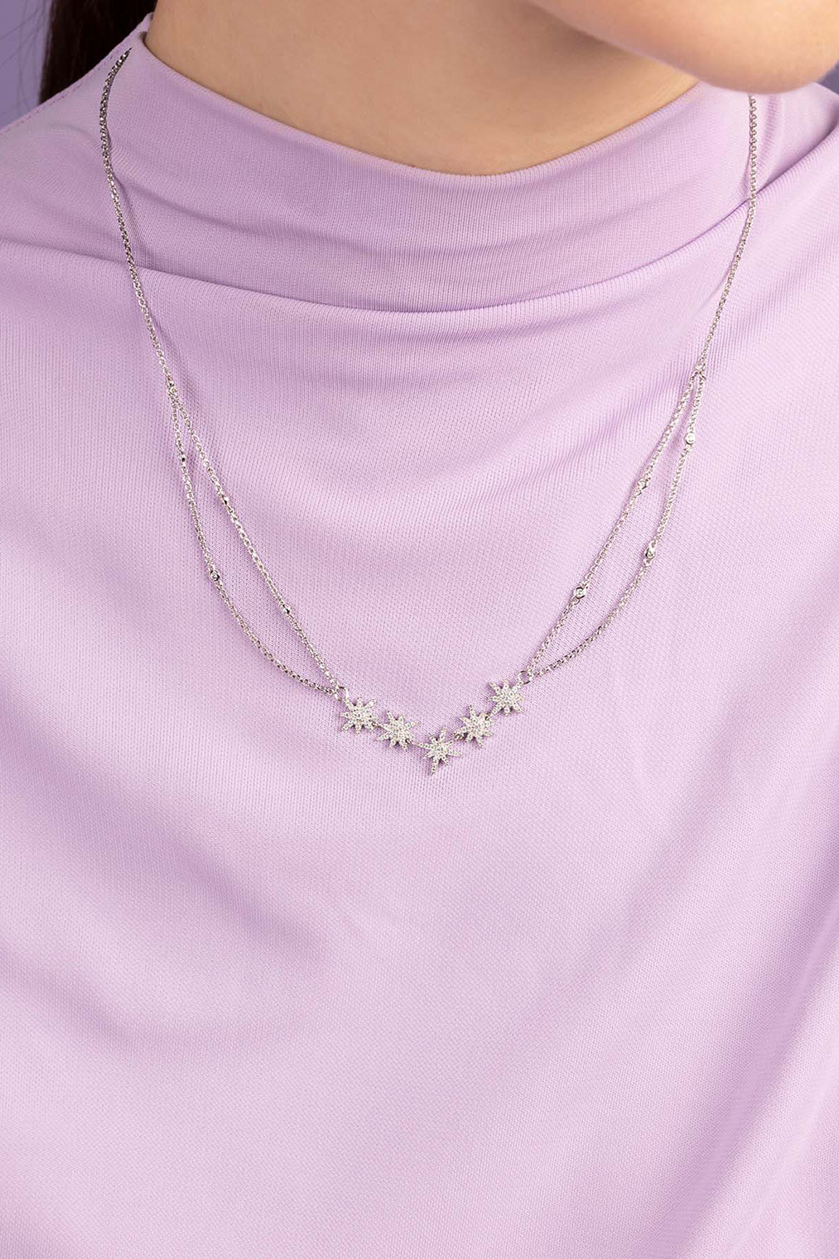 APM Monaco Meteorites Double Adjustable Necklace worn on model with lilac background