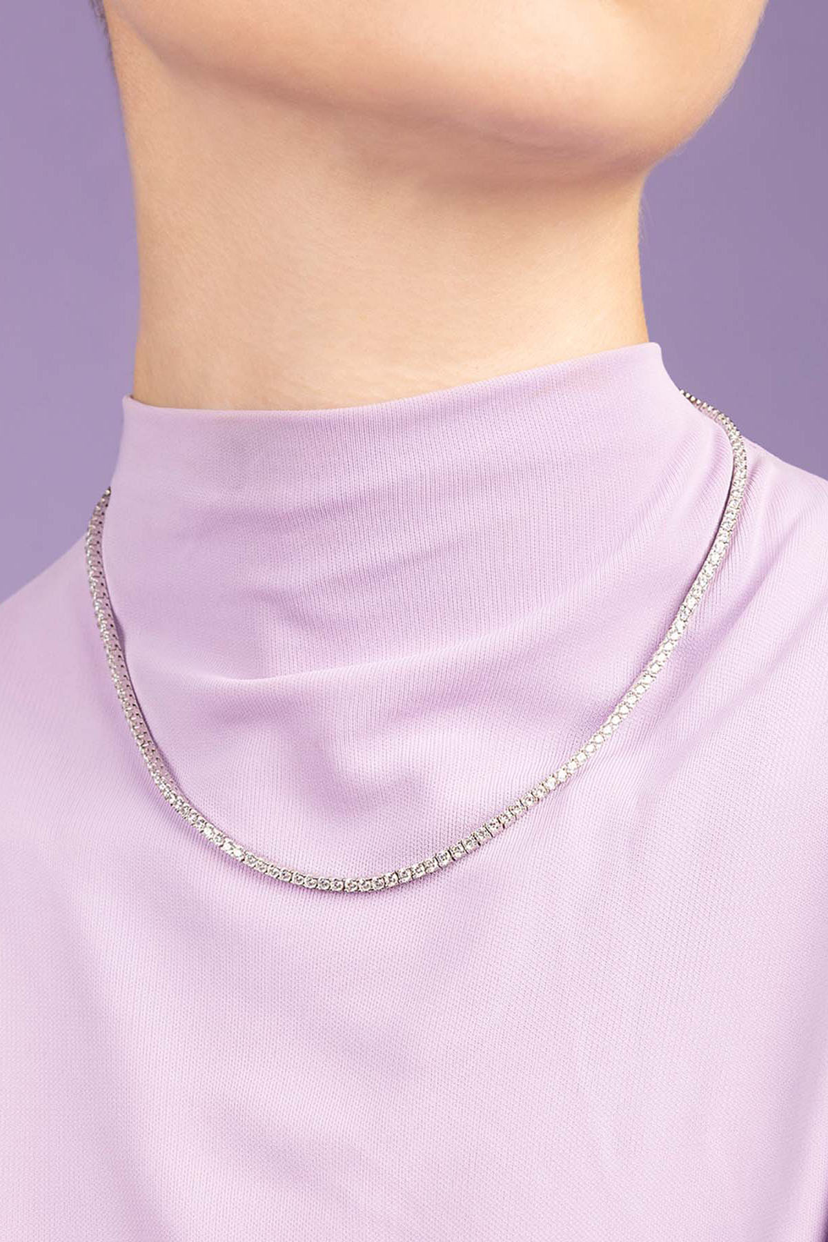 APM Monaco Pave Choker worn on model with lilac background