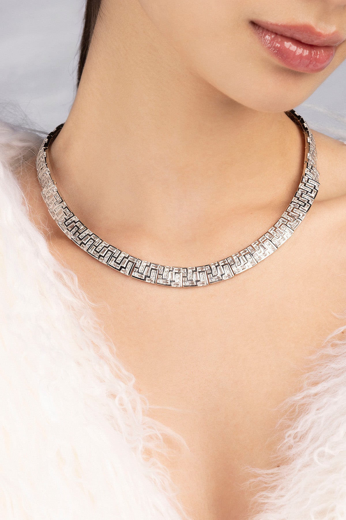 APM MONACO silver labyrinth necklace on a model