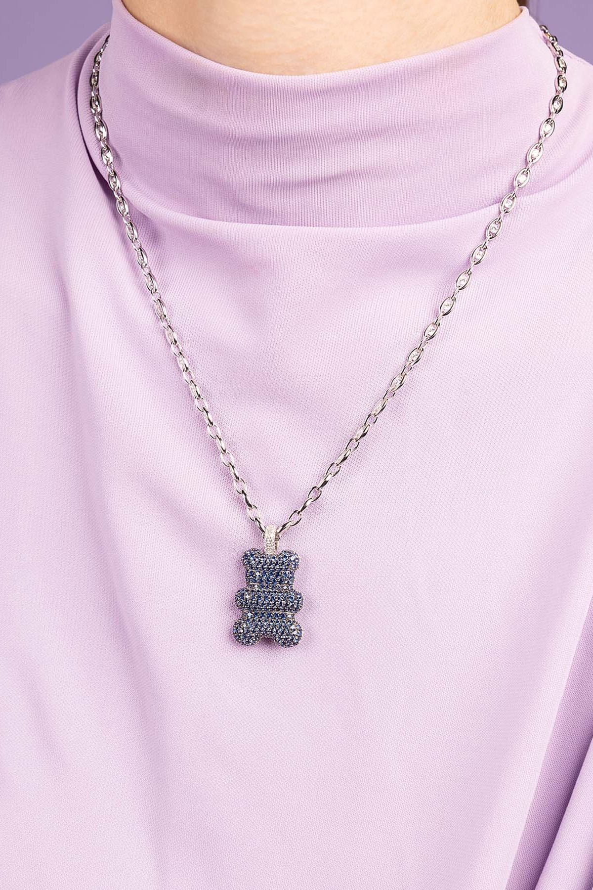 APM Monaco XL Baba Yummy Bear Adjustable Necklace worn on model with lilac background