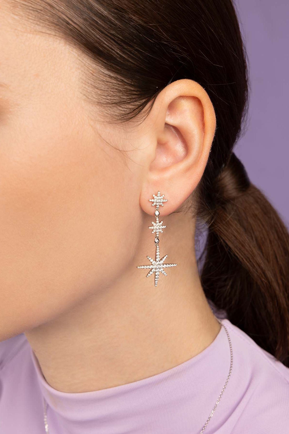 APM Monaco Triple Meteorites Drop Earring Worn on ear