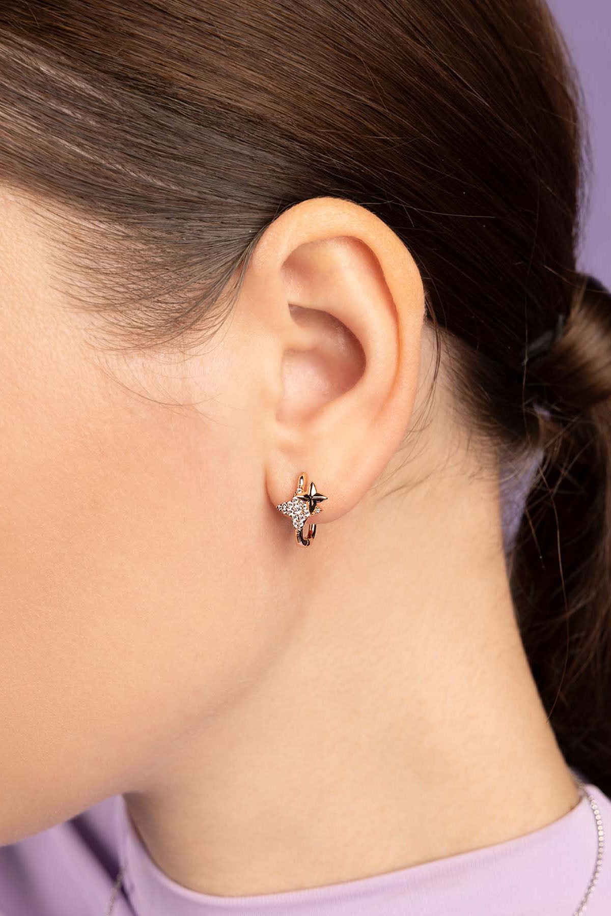 APM Monaco Meteorites Rose Gold Square Hoop Earring worn on model with lilac background