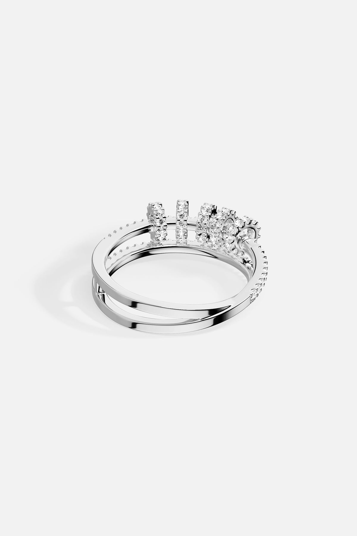 APM Monaco white gold double-ring with sliding hoops and pavé stones.